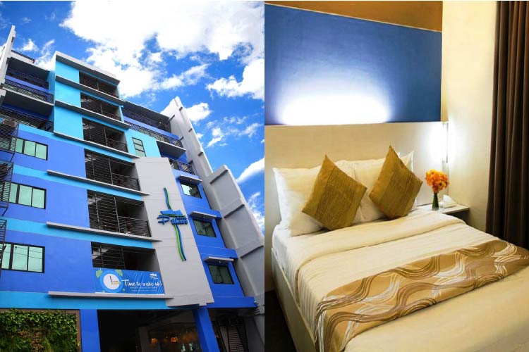 ７階建ての青い外観のホテルと客室のベット
